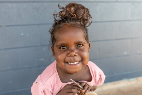 Smiling 3yo Aboriginal girl - Australian Stock Image