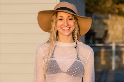 smiling woman wearing hat - Australian Stock Image