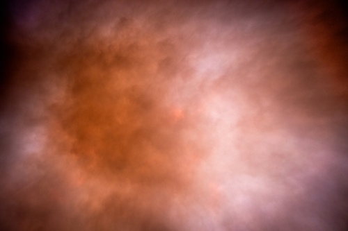 Soft light through a dusty evening sky - Australian Stock Image