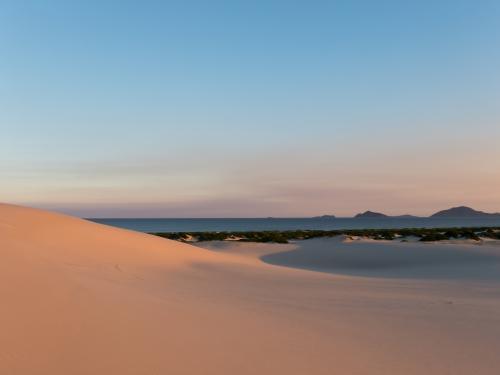 Soft pastel sand dunes in the late afternoon - Australian Stock Image