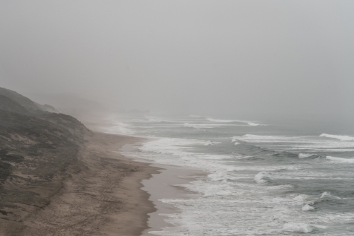 soft winters sea mist along the coastline - Australian Stock Image