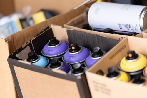 Spray paint colours in box - Australian Stock Image