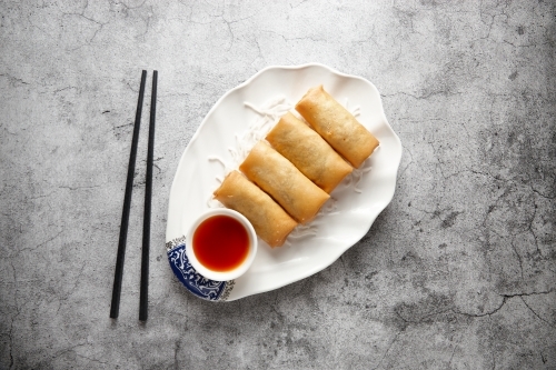 Spring roll dish on table - Australian Stock Image