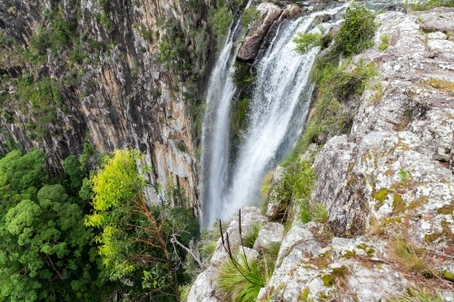 Steep rock face of Whian Whian Falls - Australian Stock Image