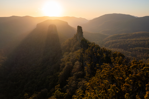 Steep rocky mountain landscape at sunset - Australian Stock Image
