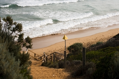 steep steps leading down to a surf beach - Australian Stock Image
