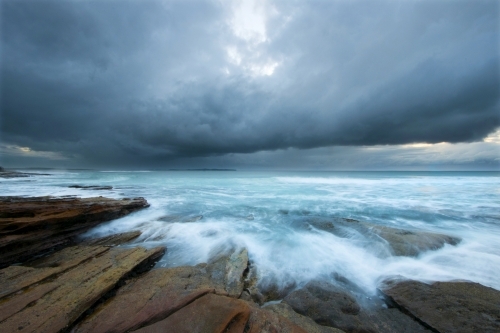 Storm clouds over coastline - Australian Stock Image
