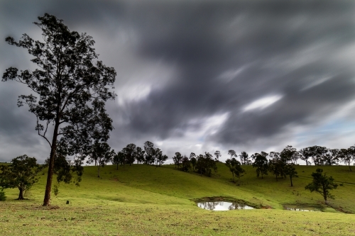 Storm clouds over farmland - Australian Stock Image