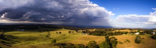 Storm over Glasshouse Mountains - Australian Stock Image