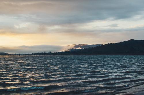 Stormy lake at sunrise - Australian Stock Image