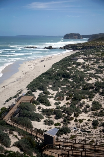 Stretch of coastline with boardwalk down to beach - Australian Stock Image