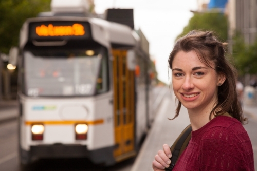 Student About to Catch the Tram - Australian Stock Image