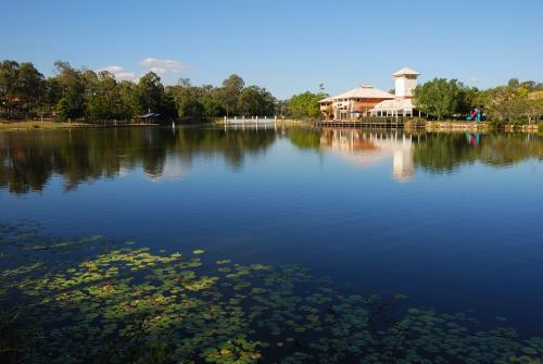 Suburb with shops and cafes by the lake. - Australian Stock Image