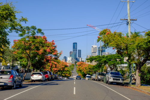 Suburban Street with Brisbane CBD in the Background - Australian Stock Image