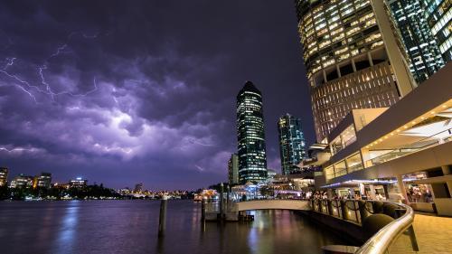 Summer Storm Over the Brisbane River from Eagle Street Pier - Australian Stock Image