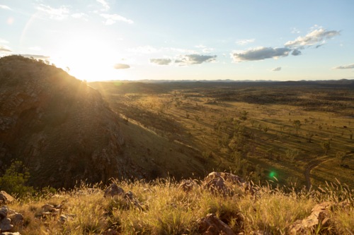Sun setting over the desert - Australian Stock Image
