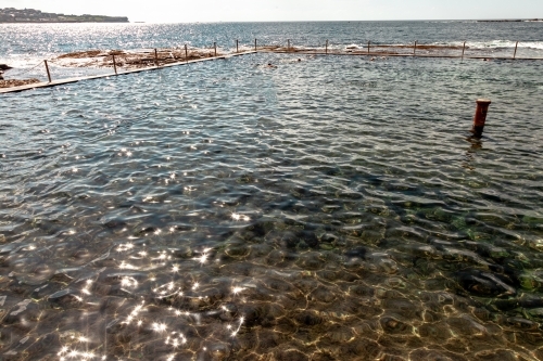 Sunlight reflected on an ocean pool - Australian Stock Image