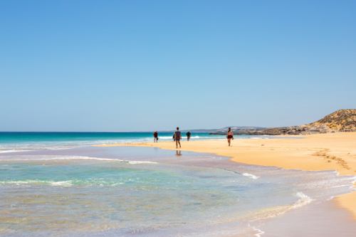 Sunlit Australian beach in the summer - Australian Stock Image