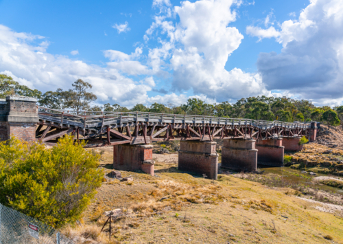 Sunnyside rail bridge over Tenterfield Creek, as seen from the New England Highway, new south wales - Australian Stock Image