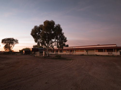 Sunrise at an old petrol station in White Cliffs, New South Wales - Australian Stock Image