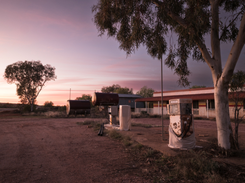 Sunrise at an old petrol station in White Cliffs, New South Wales - Australian Stock Image
