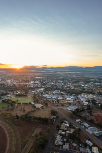 Sunrise hot air balloon ride view over Mareeba in the Atherton Tablelands - Australian Stock Image