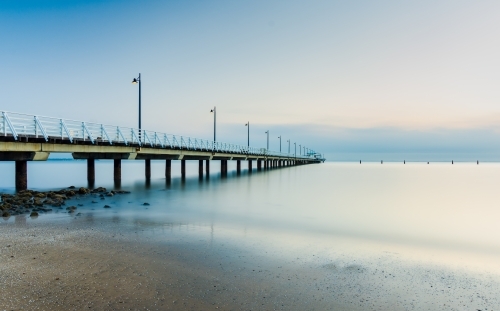 Sunrise over Sandgate Pier - Australian Stock Image