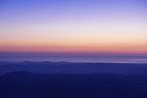 Sunrise overlooking northern NSW from top of Mt Warning