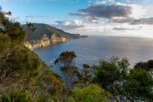 Sunrise view of cliffs on the Tasman Peninsula - Australian Stock Image