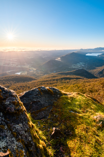 Sunrise viewed from Boroka Lookout towards Halls Gap, Grampians mountain range, Victoria, Australia - Australian Stock Image