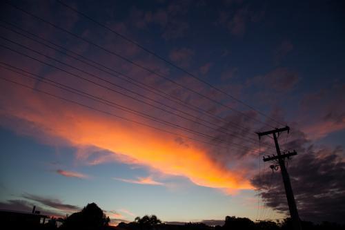 Sunset and power lines - Australian Stock Image