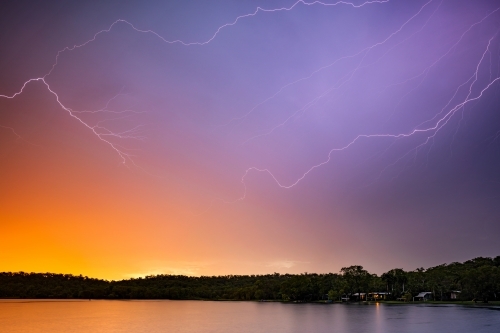 Sunset Lightning over Lake in Northern Territory - Australian Stock Image