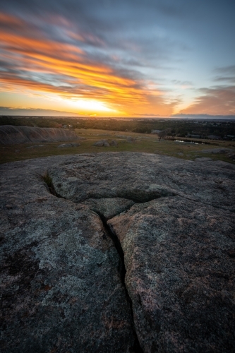 Sunset over a Rocky Rural Paddock - Australian Stock Image