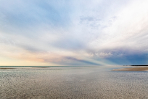 sunset over beach - Australian Stock Image