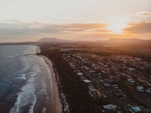 Sunset over the beachfront properties at Lake Cathie