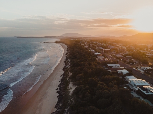 Sunset over the beachfront properties at Lake Cathie - Australian Stock Image