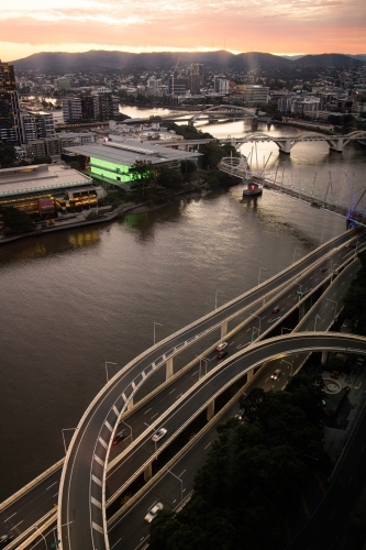 Sunset over the Brisbane River looking towards Mt Coot-tha at dusk - Australian Stock Image