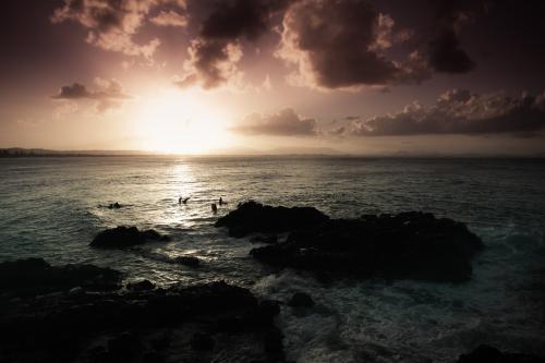 Sunset surf at Byron Bay - Australian Stock Image