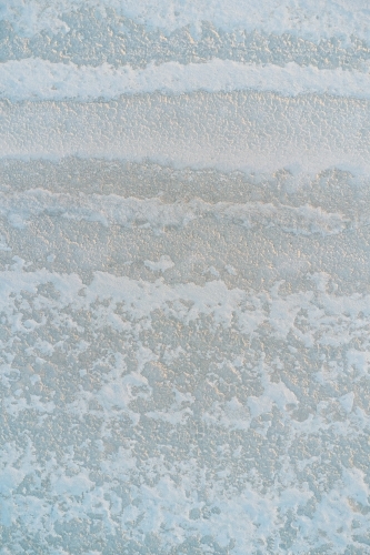 Surface texture and pattern of a dry salt lake - Australian Stock Image