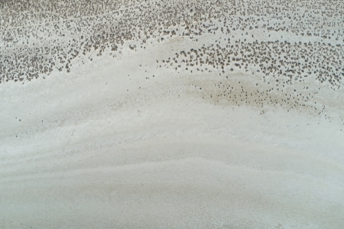 Surface texture and patterns of a dry salt lake - Australian Stock Image