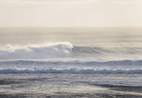 surfer riding a big wave - Australian Stock Image