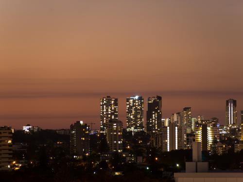 Surfers Paradise at dusk with a hazy smokey backdrop - Australian Stock Image