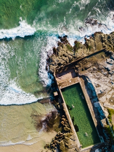 Swimmers at an ocean pool in New South Wales - Australian Stock Image