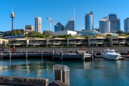 Sydney city skyline with harbour and boat in the foreground - Australian Stock Image