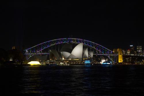 Sydney harbour in darkness with opera house and bridge - Australian Stock Image