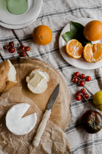 tablescape of a cheese and other picnic foods - Australian Stock Image