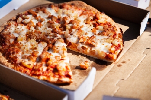 Takeaway pizza for a easy meal - Australian Stock Image