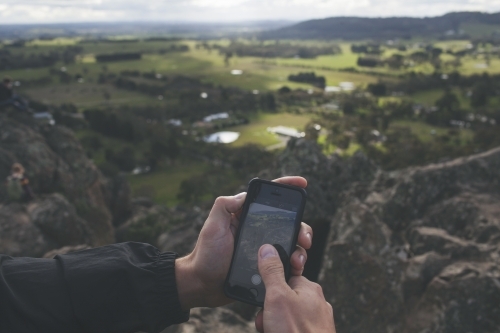 Taking photos of a valley with a smartphone