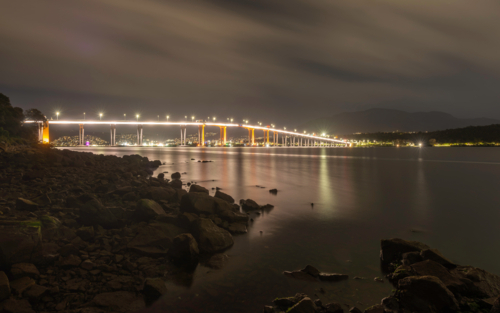 Tasman Bridge light up at night with Mount Wellington in the background - Australian Stock Image