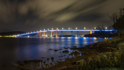 Tasman Bridge light up blue at night - Australian Stock Image